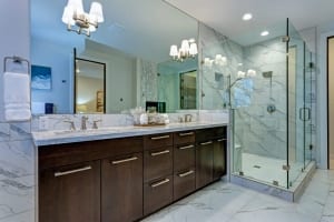 Incredible master bathroom with Carrara marble tile surround.